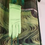 light green glove with tassels