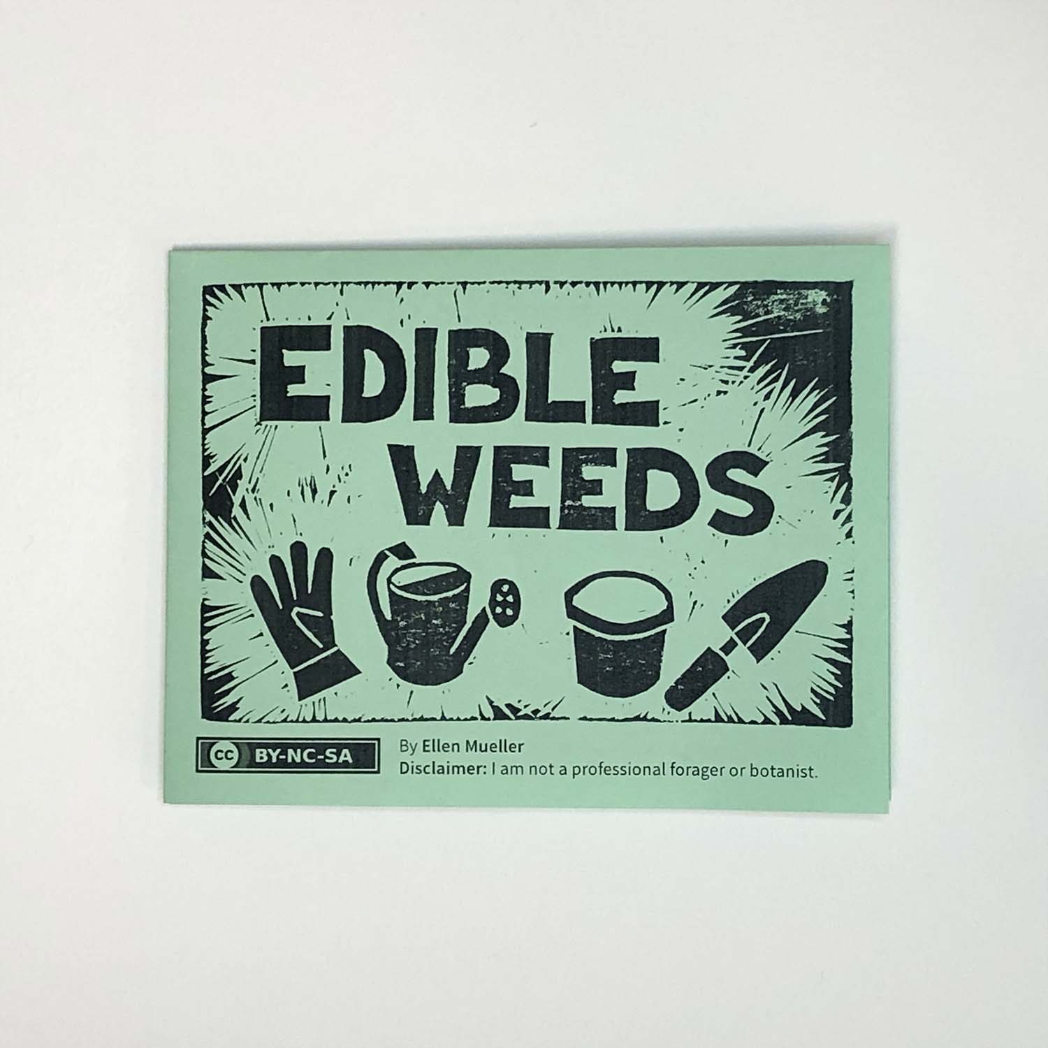 cover of quarter page folded zine stating 'edible weeds'